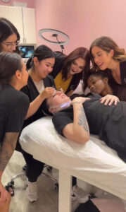a group of lash artists filming a social media trend